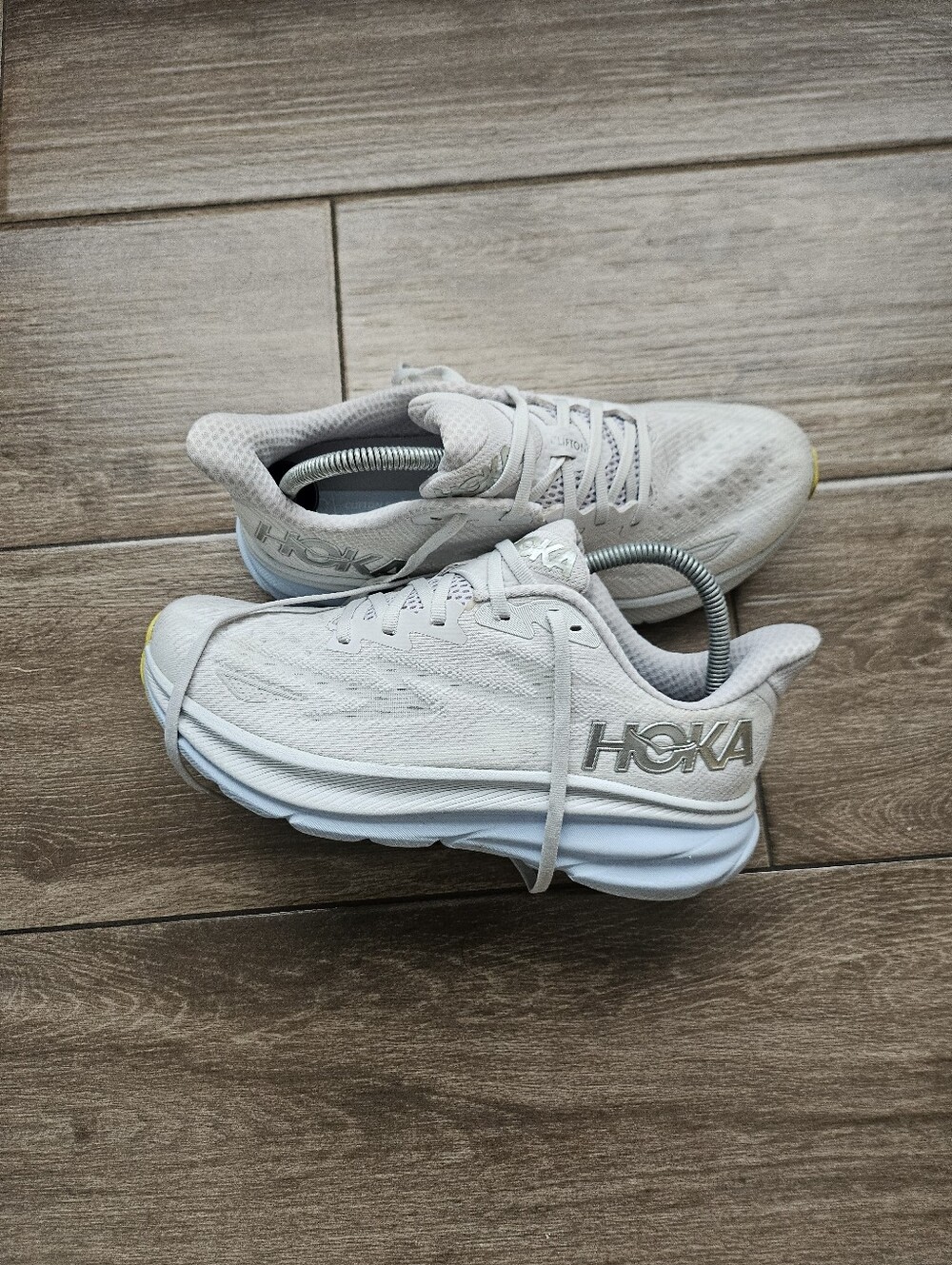 Hoka Women's White Athletic Running Shoes with Subtle Yellow Accent